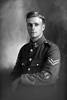 3/4 portrait of Corporal Le Grice of the 3rd (Auckland) Regiment, Auckland Infantry Regiment, wearing the proficiency badge of an assistant instructor in signalling and crossed rifles of a marksman. (Photographer: Herman Schmidt, 1916). Sir George Grey Special Collections, Auckland Libraries, 31-G522. No known copyright.