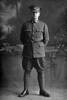 Full length portrait of Private Vivian Leonard Gittos, Reg No 3/2509, of the New Zealand Medical Corps. (Photographer: Herman Schmidt, 1916). Sir George Grey Special Collections, Auckland Libraries, 31-G2360. No known copyright.