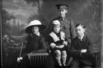 Group portrait of Private William Glasson, Reg No 18788, of the Auckland Infantry Battalion, - A Company, 15th Reinforcements, and family of a woman and two children. The woman is probably his mother Alice Glasson. (Photographer: Herman Schmidt, 1916). Sir George Grey Special Collections, Auckland Libraries, 31-G2365. No known copyright.