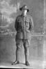 Full portrait of Private Forde, 22nd Reinforcements, probably Private Norman Arthur Forde, Reg no. 38679, 22nd Reinforcements - E Company, killed in action, 3/10/1917, France (Photographer: Herman Schmidt, 1917). Sir George Grey Special Collections, Auckland Libraries, 31-F2598. No known copyright.
