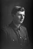 1/4 portrait of Albert Edwin James Greenwood, Reg No 52414, of the 27th Reinforcements, E Company. (Photographer: Herman Schmidt, 1917). Sir George Grey Special Collections, Auckland Libraries, 31-G3719. No known copyright.