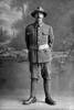Full length portrait of Rifleman Charles Hillson, Reg No 26/1607, of the 2nd Reinforcements to the 4th Battalion,  - H Company. New Zealand Rifle Brigade. Killed in action in France on 7 June 1917 at the Battle of Messines. (Photographer: Herman Schmidt, 1916). Sir George Grey Special Collections, Auckland Libraries, 31-H607. No known copyright.