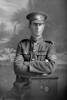 3/4 portrait of Sergeant (later 2nd Lieutenant in the nominal rolls) Alfred Cecil Christopher Hunter, Reg No 18216, of the 10th Reinforcements to the 2nd Battalion, - F Company, New Zealand Rifle Brigade. (Photographer: Herman Schmidt, 1916). Sir George Grey Special Collections, Auckland Libraries, 31-H654. No known copyright.
