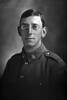 1/4 portrait of Private Robin Hamley, Reg No 31636, of the Auckland Infantry Battalion, - A Company, 19th Reinforcements. Died of wounds in France on 6 October 1917. (Photographer: Herman Schmidt, 1916). Sir George Grey Special Collections, Auckland Libraries, 31-H2012. No known copyright.