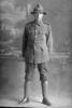 Full length portrait of Private James Duncan McLeod, Reg No 12/3761, of the Auckland Infantry Battalion, - A Company, 9th Reinforcements. (Photographer: Herman Schmidt, 1916). Sir George Grey Special Collections, Auckland Libraries, 31-L702. No known copyright.