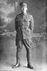 Full length portrait of Lance Corporal Henry Lupton, Reg No 26869, of the Auckland Infantry Battalion, - A Company, 17th Reinforcements (Photographer: Herman Schmidt, ). Sir George Grey Special Collections, Auckland Libraries, 31-L2833. No known copyright.