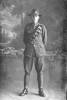 Full length portrait of Sapper George Langlands of the New Zealand Engineers, Divisional Signallers, New Zealand Signal Corps, 28th Reinforcements. (Photographer: Herman Schmidt, 1917). Sir George Grey Special Collections, Auckland Libraries, 31-L3411. No known copyright.