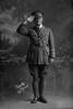 Full length portrait of Lieutenant Herbert Albert Edwin Milnes, Reg No 22525, of the 3rd (Auckland) Regiment, Auckland Infantry Regiment, Ships Adjutant of the 21st Reinforcements, Headquarters Staff. Killed in action in France on the 4th October 1917 at the Battle of Passchendaele. (Photographer: Herman Schmidt, 1916). Sir George Grey Special Collections, Auckland Libraries, 31-M2344. No known copyright.