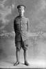 Full length portrait of Rifleman Edward Montgomery, Reg No 44653 of the New Zealand Rifles Brigade, J Company, 24th Reinforcements. (Photographer: Herman Schmidt, 1917). Sir George Grey Special Collections, Auckland Libraries, 31-M3201. No known copyright.