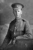 3/4 portrait of Rifleman Edward Montgomery, Reg No 44652 of the New Zealand Rifles Brigade, J Company, 24th Reinforcements. Edward was killed in action in France on 21st November 1917. (Photographer: Herman Schmidt, 1917). Sir George Grey Special Collections, Auckland Libraries, 31-M3203. No known copyright.