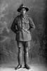 Full length portrait of Private Matanga, possibly Private Tawheo Matenga, Reg No 19961, of the New Zealand Maori Pioneer Battalion, Maori Contingent, 22nd Reinforcements. (Photographer: Herman Schmidt, 1917). Sir George Grey Special Collections, Auckland Libraries, 31-M3841. No known copyright.