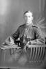 3/4 portrait of Private Charles Patrick O'Hanlon, Reg No 66008, of the Otago Infantry Regiment, - D Company, 33rd Reinforcements. (Photographer: Herman Schmidt, 1917). Sir George Grey Special Collections, Auckland Libraries, 31-O3869. No known copyright.