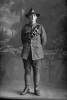 Full length portrait of Gunner Richard Beaumont Penny, Reg No 43870, of the New Zealand Field Artillery. (Photographer: Herman Schmidt, 1917). Sir George Grey Special Collections, Auckland Libraries, 31-P3459. No known copyright.