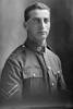 1/4 portrait of Corporal Plyaro (?) of the Specialist Company. Possibly (Sergeant in the roll) Marcus George Pezaro, Reg No 46242, of the Specialist Company (Signal Section). Born in Australia. (Photographer: Herman Schmidt, 1917). Sir George Grey Special Collections, Auckland Libraries, 31-P3466. No known copyright.