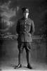 Full length portrait of Private Charles Stuart Ramsay of the 17th Reinforcements, Auckland Infantry Battalion, - A Company. (Photographer: Herman Schmidt, 1916). Sir George Grey Special Collections, Auckland Libraries, 31-R2103. No known copyright.