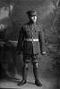 Full length portrait of Private Percy Rameka, Reg No 16/1574, of the 5th Maori Contingent, New Zealand Maori Pioneer Battalion. Died at sea en route to New Zealand from France on 26 May 1918. (Photographer: Herman Schmidt, 1916). Sir George Grey Special Collections, Auckland Libraries, 31-R2106. No known copyright.