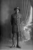 Full length portrait of Private Ernest Ruby, Reg No 64354, of the 32nd Reinforcements, E Company. (Photographer: Herman Schmidt, 1917). Sir George Grey Special Collections, Auckland Libraries, 31-R3922. No known copyright.