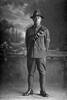 Full length portrait of Corporal L M Swales, of the New Zealand Field Artillery. (Photographer: Herman Schmidt, 1916). Sir George Grey Special Collections, Auckland Libraries, 31-S2126. No known copyright.