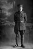 Full length portrait of Private Harold John Stilton, Reg No 26936, of the Auckland Infantry Battalion, - A Company, 17th Reinforcements. (Photographer: Herman Schmidt, 1916). Sir George Grey Special Collections, Auckland Libraries, 31-S2170. No known copyright.