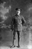 Full length portrait of Sapper Joseph George Tabb, Reg No 4/1314 of the New Zealand Engineers Tunnelling Company. (Photographer: Herman Schmidt, 1915). Sir George Grey Special Collections, Auckland Libraries, 31-T1177. No known copyright.