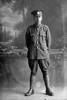 Full length portrait of Private Uffindale of the 22nd Reinforcements, - E Company. (Photographer: Herman Schmidt, 1917). Sir George Grey Special Collections, Auckland Libraries, 31-U3956. No known copyright.