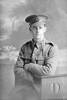 3/4 portrait of Rifleman A E Warner of the 3rd Battalion, New Zealand Rifle Brigade. Probably Rifleman Ernest Aldred Warner, Reg No 25/1145, - D Company. (Photographer: Herman Schmidt, 1916). Sir George Grey Special Collections, Auckland Libraries, 31-W1275. No known copyright.