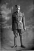 Full length portrait of Lance Corporal (Corporal in the nominal roll) Ralph White, Reg No 14518, of the Auckland Infantry Battalion, - A Company, 14th Reinforcements. Killed in action in France on 4 October 1917 at the Battale of Passchendaele. (Photographer: Herman Schmidt, 1916). Sir George Grey Special Collections, Auckland Libraries, 31-W1309. No known copyright.