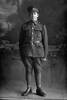 Full length portrait of Private Ernest Edwin Herman Weber, Reg No 26949, of the Auckland Infantry Battalion, - A Company, 17th Reinforcements. (Photographer: Herman Schmidt, 1916). Sir George Grey Special Collections, Auckland Libraries, 31-W1797. No known copyright.