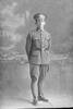 Full length portrait of Trooper Ernest Richard Warnock, Reg No 36020, of the New Zealand Mounted Rifles 24th Reinforcements. (Photographer: Herman Schmidt, 1917). Sir George Grey Special Collections, Auckland Libraries, 31-W2576. No known copyright.