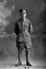 Full length portrait of Private John Weeks, Reg No 3/3446, of the New Zealand Medical Corps. (Photographer: Herman Schmidt, 1917). Sir George Grey Special Collections, Auckland Libraries, 31-W2969. No known copyright.