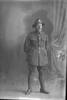 Full length portrait of Private Frederick Robert Walker, Reg No 63973, of the Auckland Infantry Regiment, - A Company, 32nd Reinforcements. (Photographer: Herman Schmidt, 1917). Sir George Grey Special Collections, Auckland Libraries, 31-W4748. No known copyright.
