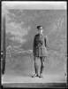 Full length portrait of Lieutenent Foubister wearing World War 1 military uniform and an Air Corps badge (Photographer: Herman Schmidt, ). Sir George Grey Special Collections, Auckland Libraries, 31-WP8062. No known copyright.