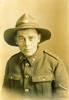 Portrait of 3/483 Ormond Burton in Lance Corporal Uniform in 1916, Field Ambulance, photo at USA Studio, Edgeware Road, London. No Known Copyright.