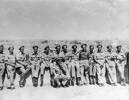 Informal group photo of 14 soldiers during WWII, including Darcy Gardiner, s/n 800706 at extreme right of photo. (Collection of Darcy Gardiner (800706)) . Image provided by Brian Gardiner. This image may be subject to copyright.