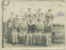 Charlotte Le Gallais with her orderlies on the Maheno. Front row: l-r Clara Hawkins, Unknown, Matron Evelyn Brooke RRC & Bar, Sister Margaret Tucker, uknown. Middle right (extreme right) Charlotte LeGallais. Back row Mary Gould (second from the left). Le Gallais family. Auckland War Memorial Museum Library. PH-1995-2-21. No known copyright restrictions.