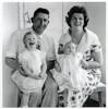 Family portrait taken in late 1963 with William Arthur Johnson holding Rhona Johnson and Jessie McGowna Richardson Johnson holding Elean Johnson. Image provided by Peter Nightingale. Image has no known copyright restrictions.