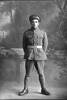 Full length portrait of Private Edmund Duffy. (Photographer: Herman Schmidt, 1916). Sir George Grey Special Collections, Auckland Libraries, 31-D1527. No known copyright.