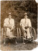 Photograph of Private Ivor Norman Fleet (Norm) 31249 with an unknown soldier in wheelchairs. Image kindly provided by Michael Thoms (November 2017). Image has no known copyright restrictions.