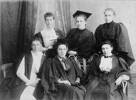 Group of female university undergraduates photographed by Naudin Studios of Sydney, circa 1893. From right to left, back row: Ethel Maynard, Rosa Lichtscheindt, Georgie Harriott. Front row: Jennie B Uther, Agnes Bennett, Katie Hogg.Naudin Studios. Naudin Studios (Photographers) : Female university undergraduates, Sydney. Ref: PAColl-0040-17. Alexander Turnbull Library, Wellington, New Zealand. Image may be subject to copyright restrictions.