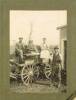 Photograph of Samuel Templeton (standing) at the Slope Point Dairy Factory in 1900. The man in the cap sitting on the cart is Charlie Humphries. Image kindly provided by Glenice (August 2018). Image has no known copyright retsrictions.