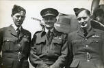 Photograph of Squadron Leader Leonard Trent, Wing Commander Gordon John 'Chopper' Grindell and Squadron Leader T. Turnbull, 487 Squadron, RAF Methwold, 1943. Image kindly Image kindly provided by Robert Pye (1997). Image may be subject to copyright restrictions.