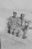 Photograph Eric Batchelor and Robert William (Ram) Reid in a slit trench, Western Desert, c.Second World War. From the collection of Arthur William (Moss) Squire 16770, 23 Battalion. Image kindly provided by Roger Sommerville (August 2019). Image may be subject to copyright copyright restrictions.