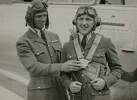 Air Force Queen Elizabeth Wilson, with Flying Officer A B Marshall at the Ardmore Carnival. March 1945. Auckland Libraries Heritage Collections 1417-1. No Known copyright restrictions.