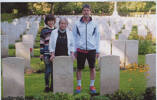 Photograph of Angela and her family with Pete's grave at Kiel War Cemetery. Image from Angela Caughey's family album. Image kindly provided by Angela Caughey nee Wilson (August 2019). Image may be subject to copyright restrictions.