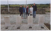 Photograph of Angela with her family after they had laid the plaques at Plougerneau Cemetery.  Image from Angela Caughey's family album. Image kindly provided by Angela Caughey nee Wilson (August 2019). Image may be subject to copyright restrictions.