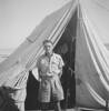 Photograph of 'wee Alec', Alexander Duthie Alexander 17006, in front of tent, possibly at Maadi Camp, c.Second World War. From the collection of Arthur William (Moss) Squire 16770, 23 Battalion. Image kindly provided by Roger Sommerville (September 2019). Image may be subject to copyright restrictions.