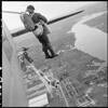 Photograph of New Zealand Air Service serviceman jumping from Valetta aircraft if the Royal Air Force Far East Transport Wing in Malaya c.1955, believed to be Corporal Graham George Sun. Alexander Turnbull Library, Wellington, M-0456-F. Image is subject to copyright restrictions.