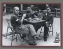 Photograph of Private Timothy McQuinn (center), at a café. Image kindly provided by Christine Hale (October 2019). Image may be subject to copyright restrictions.