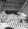 No. 41 Squadron personnel, Corporal George Grant (left) and Corporal Bruce [identified as Brian] Henderson (right), secure a load of bread in the front of a No. 41 Squadron Bristol Freighter at Tan Son Nhut airport, Saigon, Vietnam. April 1975. This is possibly relief flights to the island of Phu Quoc, where Vietnamese evacuees were gathered. Air Force Museum of New Zealand. RNZAF Official. PR1477-R1-1-75. CC BY-NC 3.0.