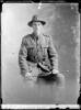 Crown Studios, Auckland. Studio portrait of a soldier. Hat and collar badges denote the New Zealand Rifle Brigade. Name from glass plate inscription possibly Private J. B. Fredrickson?. Auckland Libraries Heritage Collections 7003-284. No known copyright restrictions